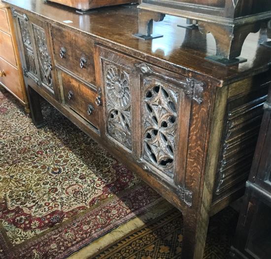 1920s carved oak Tudor style dresser base(-)